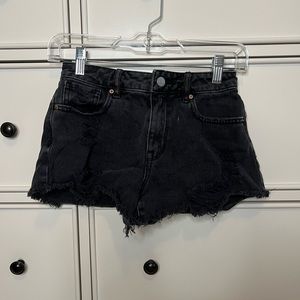 Packing black shorts